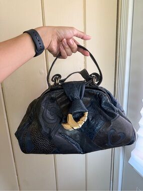 vintage leather bag patchwork with gold hardware Sharif